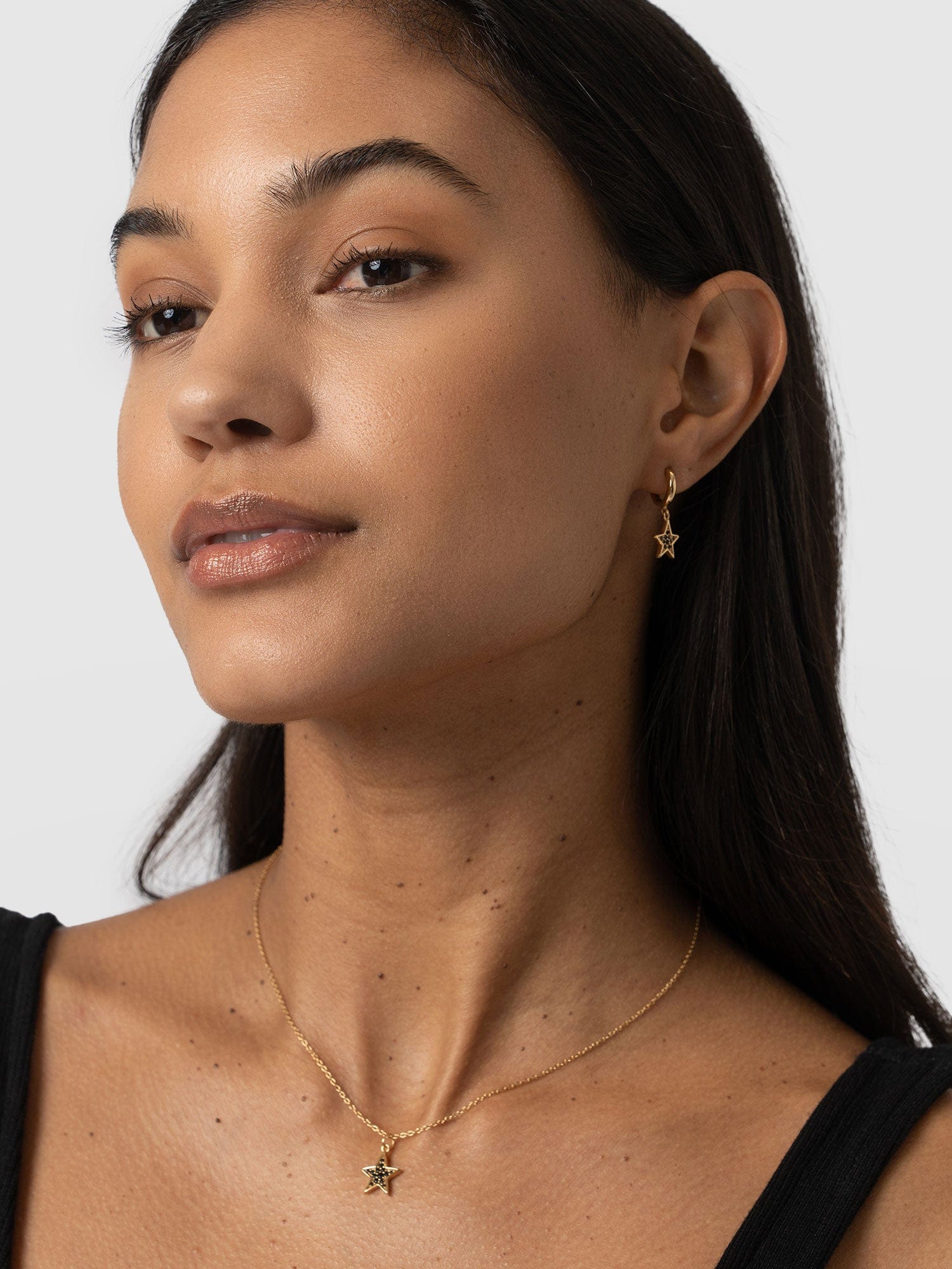 Astral Star Charm Drop Huggie Earrings - Gold/Black - Image 3